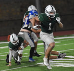 Running back Jake Wallis, who scored TCA's only touchdown, is shown picking up a big gain at the start of the third quarter.